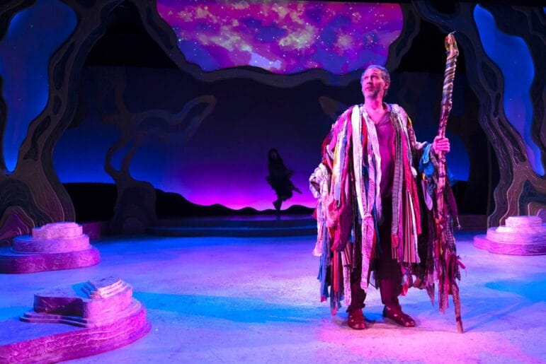 [CREDIT: Susanna Jackson] Mauro Hantman as Prospero appearing in colorful costume on one of the dazzling sets of Trinity's 'La Tempestad.'