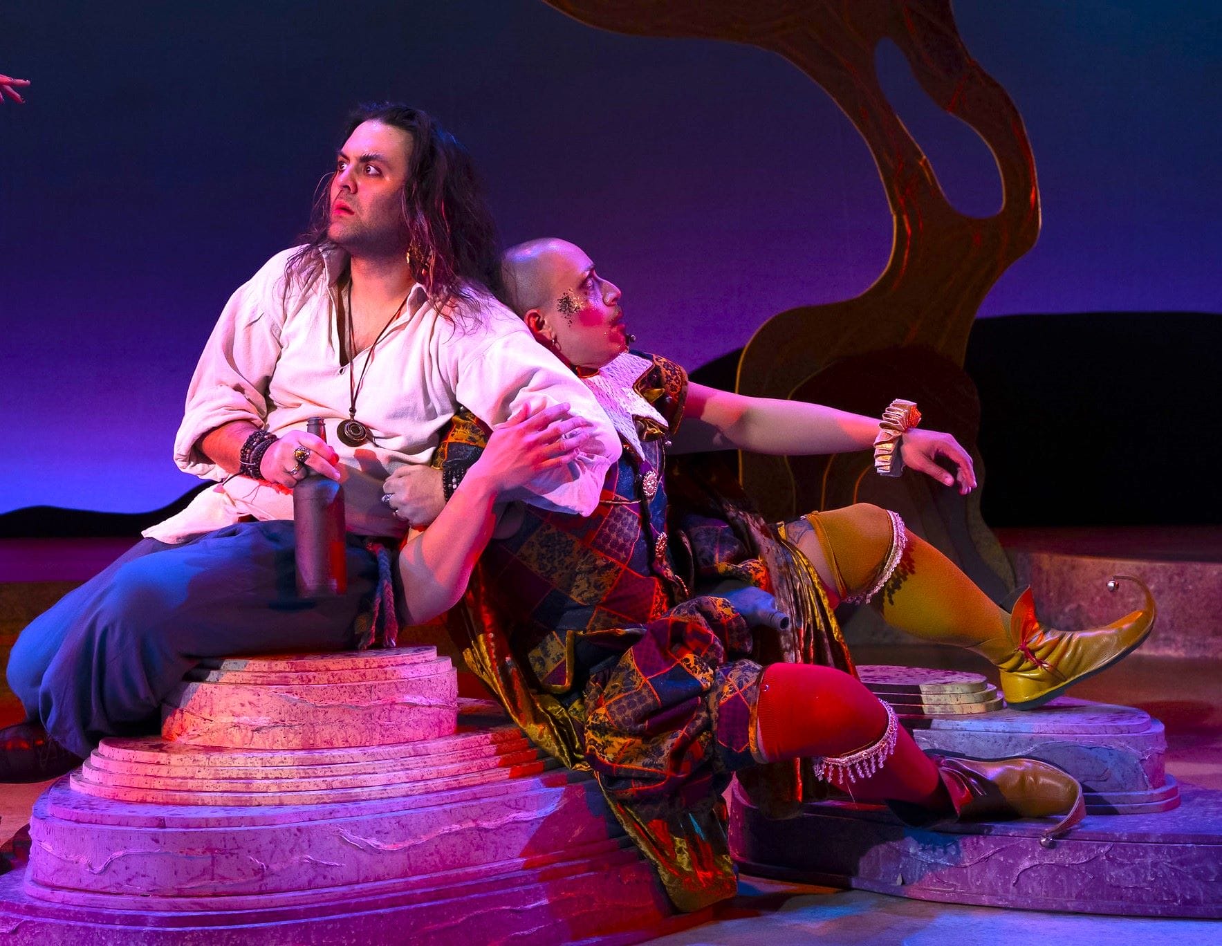 [CREDIT: Susanna Jackson] Trinculo (Adrian Peguero), the King’s jester, and Stephano (Marcel Mascaro), the King’s butler, on the beach where they will soon encounter Caliban in Trinity's 'La Tempestad.' 