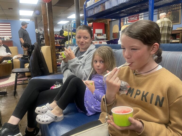 [CREDIT: Rob Borkowski] Enjoying ice cream at Suzy Q's Summit General Grand Opening, Allie Black, Hailsley Black, 4 and Sophia Black, 11.
