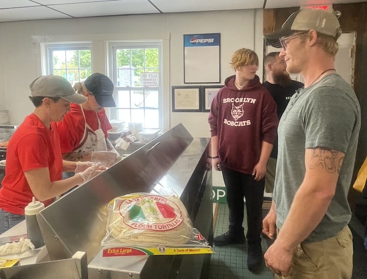 [CREDIT: Rob Borkowski] The first three customers at Suzy Q's Summit General Grand Opening hailed from Brooklyn, CT. From left, Zak L'Heureux, Kyle Desabre and Michael Christian.
