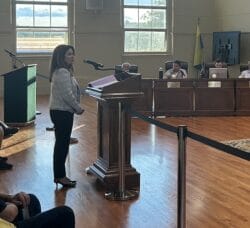 [CREDIT: Natalie Ferland] Lisa Tomasso Senior Vice President at Hospital Association of Rhode Island, urged councilors to support a General Assembly bill that would curb prescription drug costs. The Council also heard from a number of yellow-clad gun rights advocates urging the council to weigh in opposing an assault weapons ban before the General Assembly.