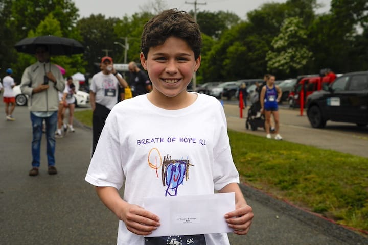 [CREDIT: Laura Paton] Will Lang of Warwick, winner of the male under 12 division. at the June 14 Gaspee Days 5k.