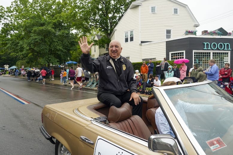 [CREDIT: Laura Paton] Grand Marshal Rev. Robert L. Marciano in the 2025 Gaspee Days Parade June 14.