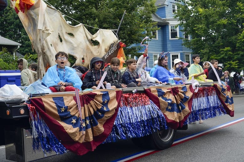 [CREDIT: Laura Paton] Students of Hoxie School on their float in the 2025 Gaspee Days Parade . Students of the Hoxie School ride on their float.