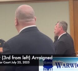 [CREDIT: Rob Borkowski] Scott Copley, third from left, appears in Kent County Superior Court July 25, 2025 at his arraignment on a charge of threatening a public official.