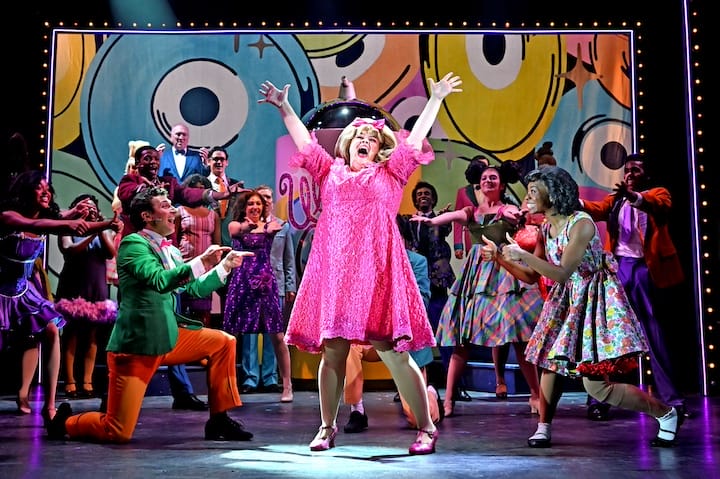 [CREDit: Theatre By the Sea] Niki Metcalf as Tracy Turnblad dreams of dancing for the “Corny Collins Show” in TBTS's "Hairspray.'