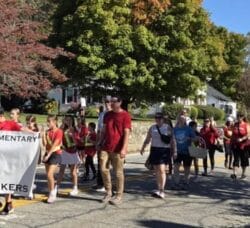 [CREDIT: Mary Carlos] Students of Tiogue Elementary School march with their Future Oakers banner during the CHS Homecoming parade Oct. 4, 2025