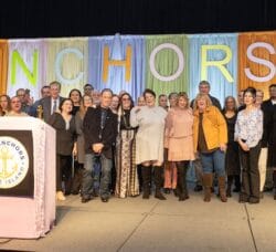 [CREDIT: RI Hospitality] More than 50 Gregg’s employees joined owners Bob, Bobbie and Rob Bacon on stage at the RI Convention Center Jan. 17 to accept The President's Award for the restaurant group during the ANCHORS awards gala.